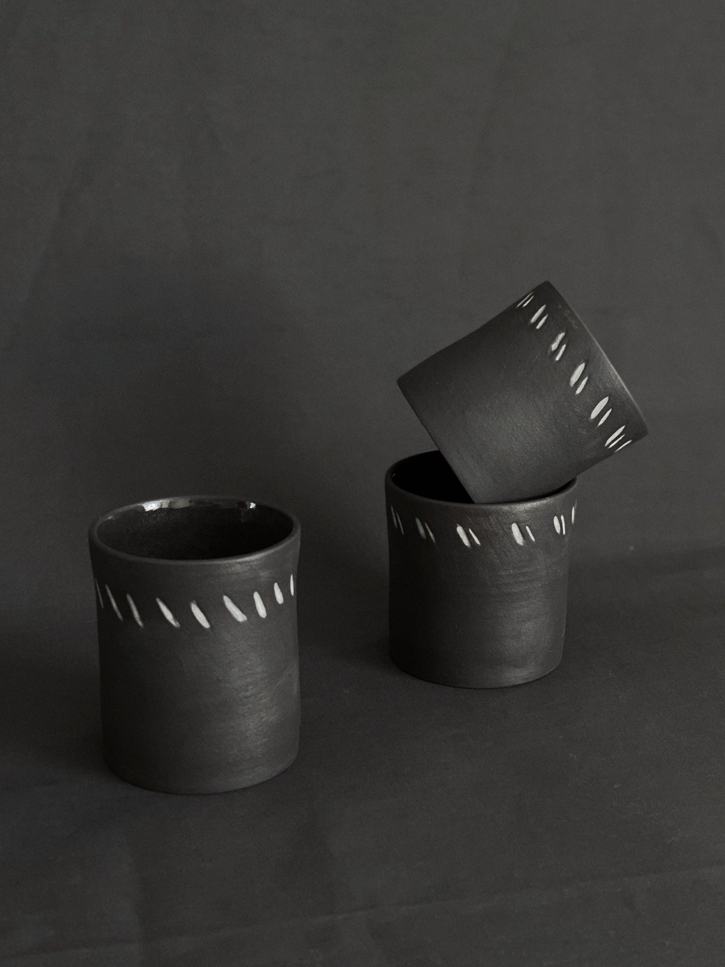 Hand-carved black porcelain latte cup