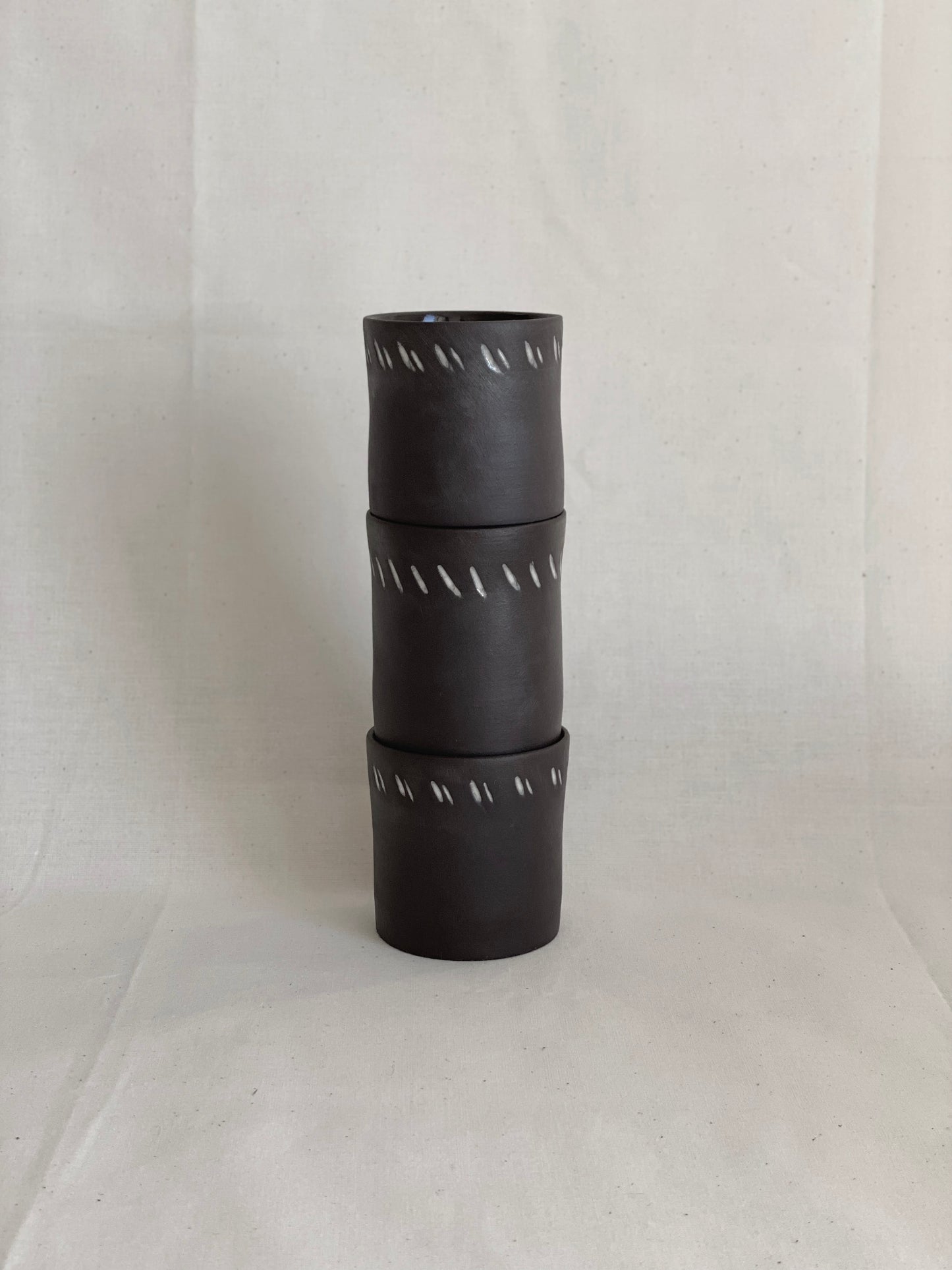 Hand-carved black porcelain latte cup